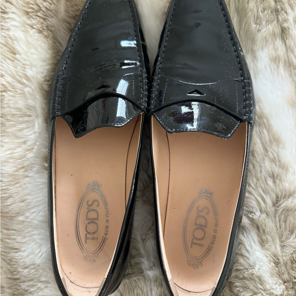 Tod’s moccasins. Black patent leather. Only worn a few times.